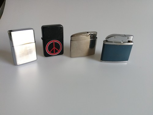 Vier feuerzeuge zippo - feuerzeuge, rowenta